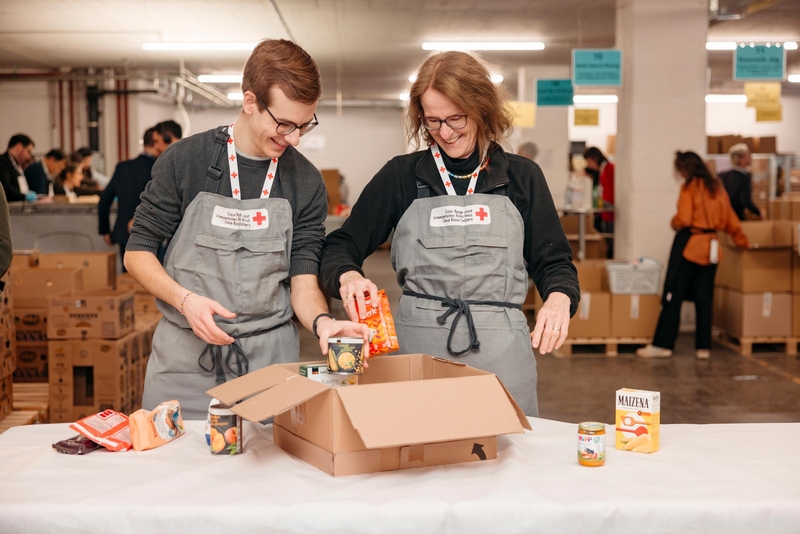 Man and woman at a packing station